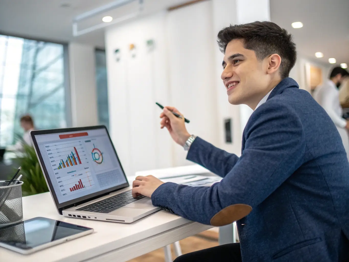 A young man confidently presenting his product to potential customers, showcasing the sales and marketing skills acquired during Week 3 of the Betta program.